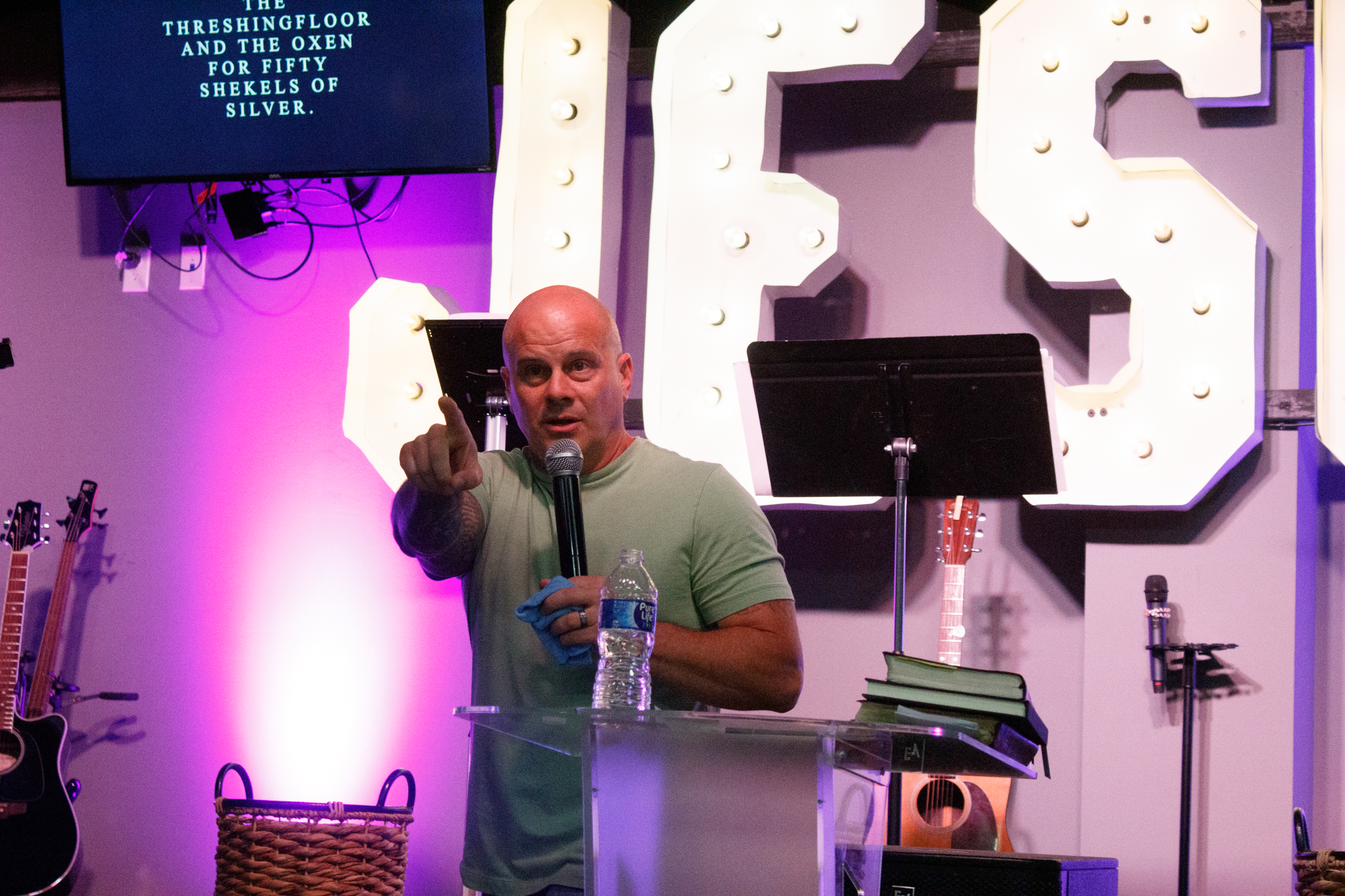 Pastor preaching at N-Vizion Church